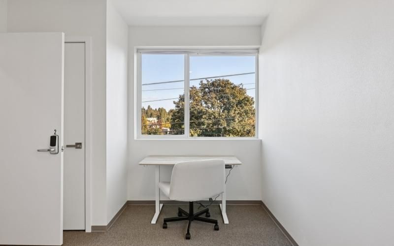 a room with a table and a chair