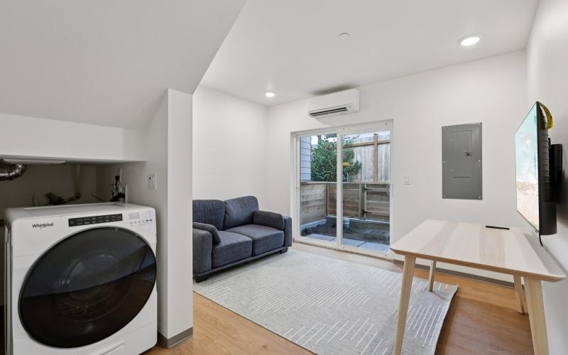 a living room with a large glass door