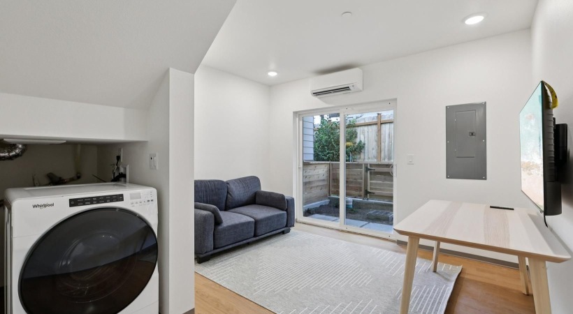 a living room with a large glass door